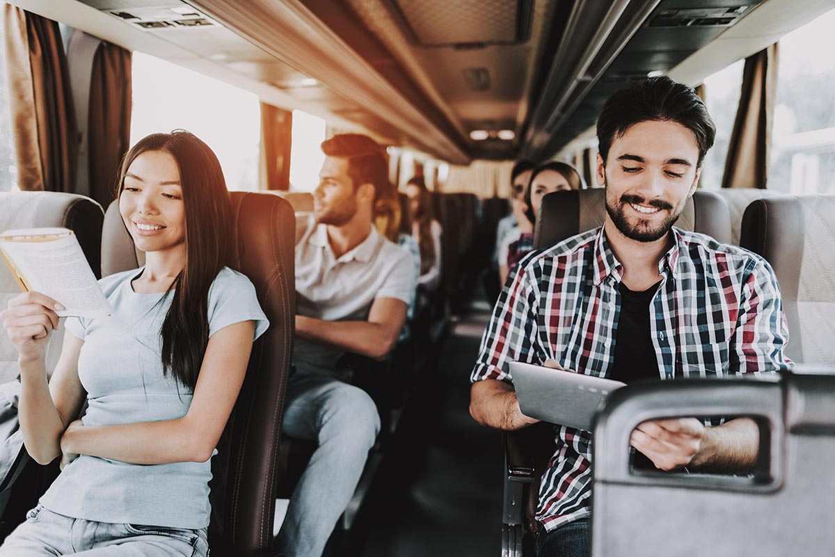 Climate-controlled cabin of a charter coach with air conditioning vents