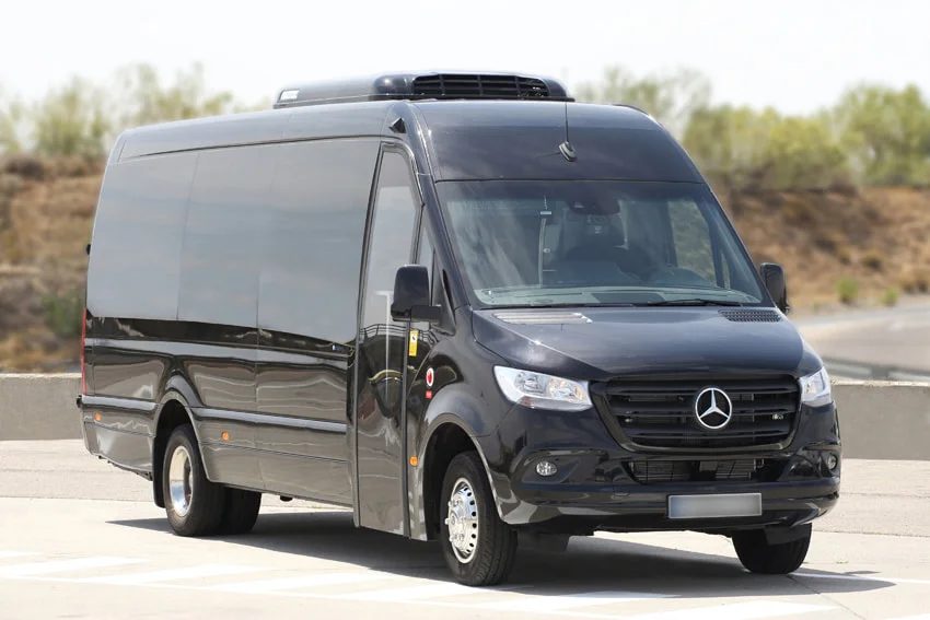 Comfortable passenger seating inside a mini bus charter van