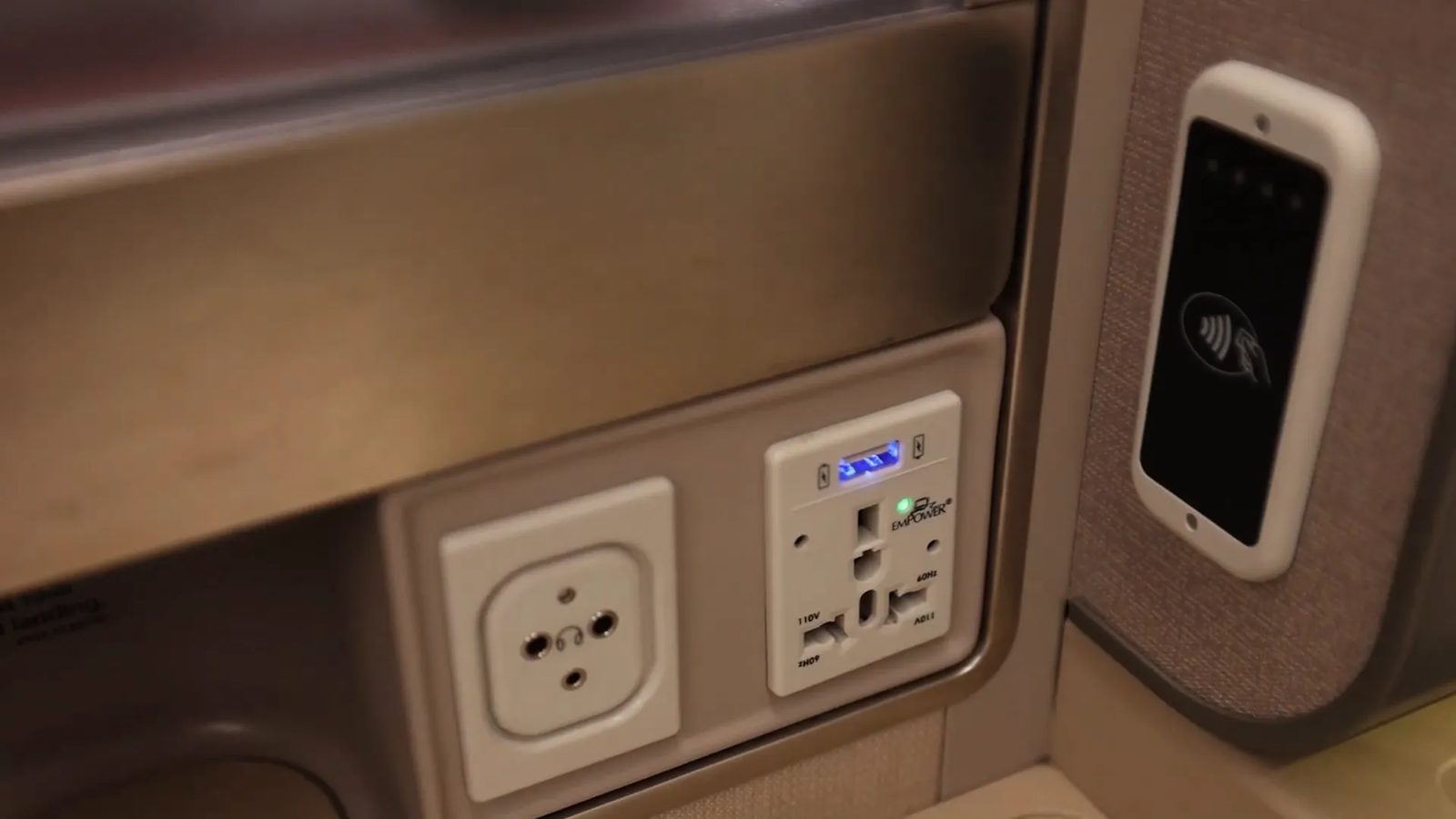 Overhead entertainment screen on board a charter coach